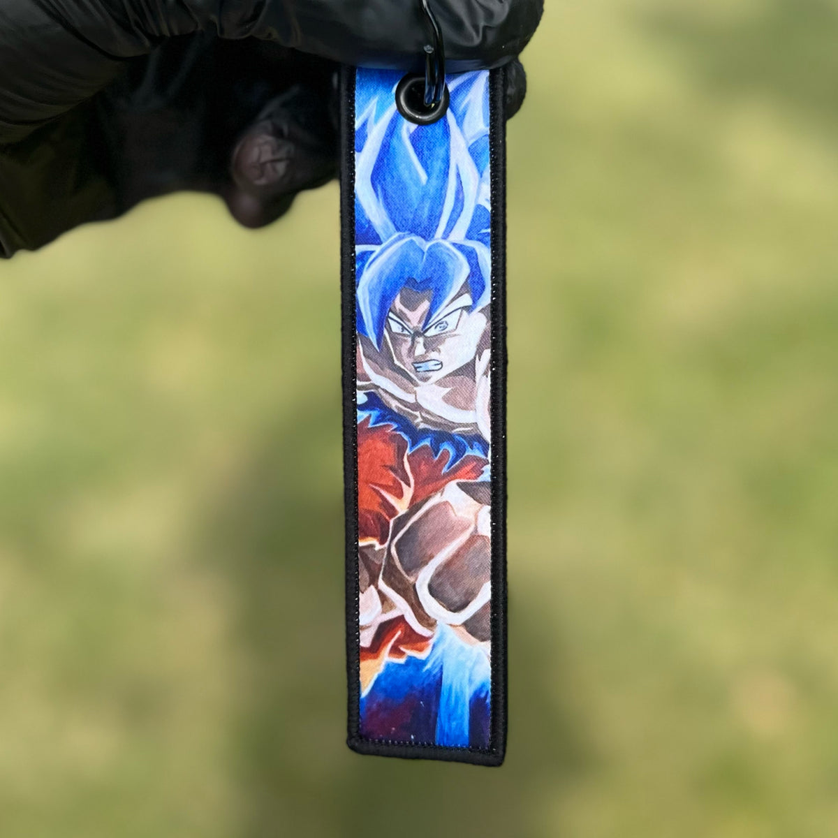 Ultra Instinct DBZ- Keychain – Tommy Manning Art